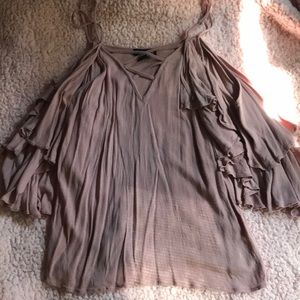 Pink blouse with flowwy sleeves